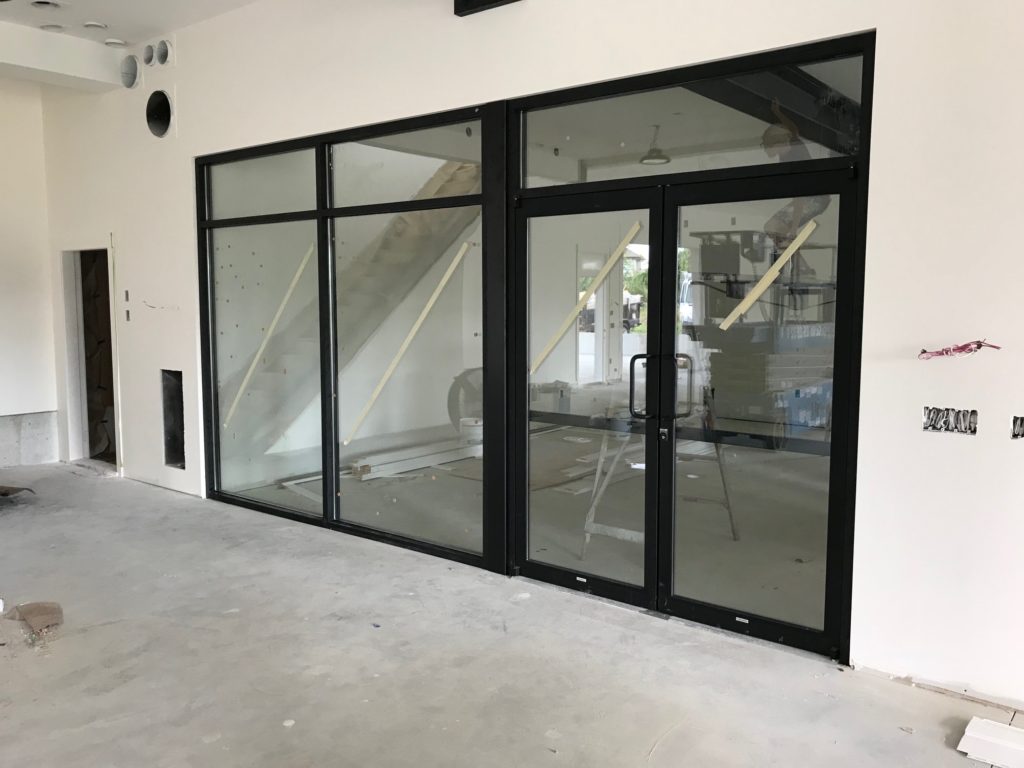 black warehouse interior glass doors